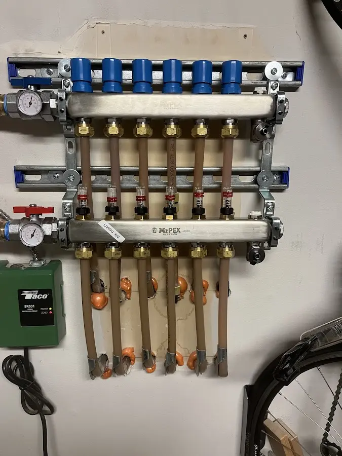 Plumber performing Leak Detection at a residential property in East Windsor